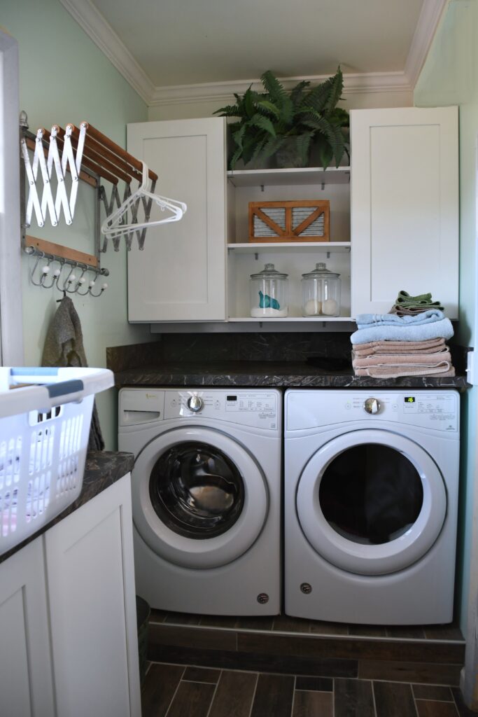 Modern laundry room in a home. Doing the wash in the laundry room at home